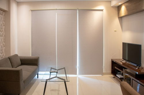 Photo 14 - Comfort 2Br Loft Apartment At Maqna Residence