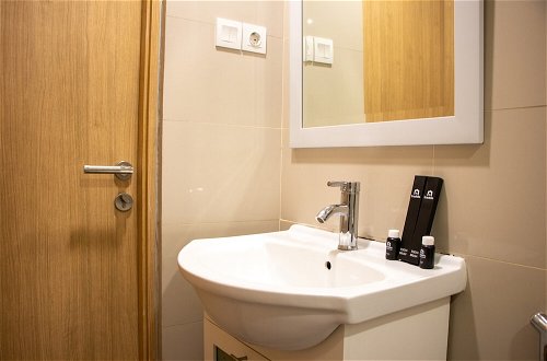 Photo 18 - Comfort 2Br Loft Apartment At Maqna Residence