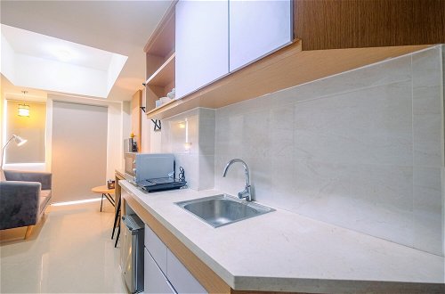 Photo 16 - Comfort 1BR Apartment at Mustika Golf Residences