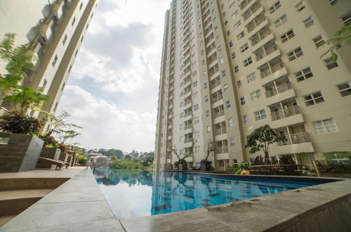 Photo 30 - Cozy Apartment at Parahyangan Residence with Direct Access to Swimming Pool