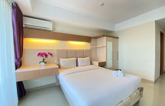 Photo 2 - Homey Furnished Studio At Beverly Dago Apartment