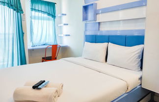 Photo 1 - Comfortable Studio Room At Vida View Makassar Apartment