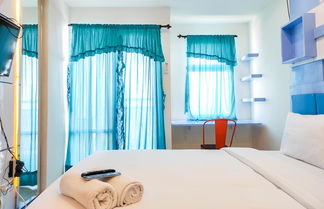 Photo 2 - Comfortable Studio Room At Vida View Makassar Apartment