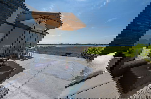 Foto 18 - Holiday Home by Veerse Meer With Panoramic View