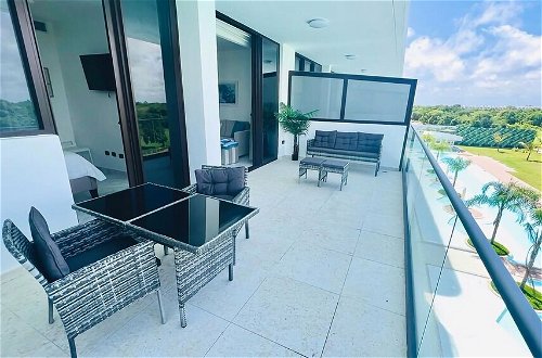 Photo 28 - Luxury Apartment With Pool And Golf View