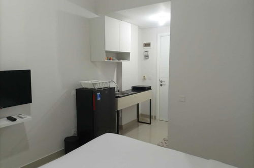 Foto 3 - Comfortable And Tidy Studio At Barsa City Apartment