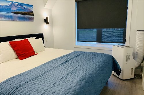 Foto 3 - Luxurious One Bedroom Suite WindTower
