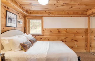 Photo 3 - Chestnut by Avantstay Mountain Cabin w/ Treetop Views, Hot Tub & Game Room