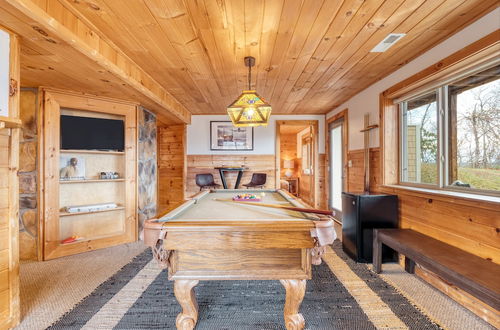 Photo 25 - Chestnut by Avantstay Mountain Cabin w/ Treetop Views, Hot Tub & Game Room