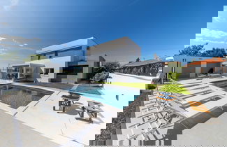 Photo 1 - Alba Family Home