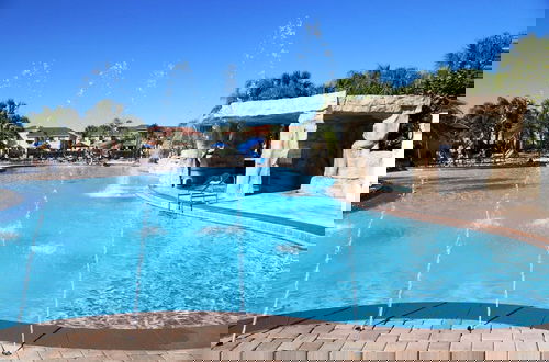 Foto 38 - Themed 5Bd Paradise Palms Close to Disney w Pool 8951