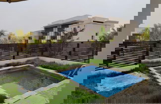 Foto 2 - One-bedroom Oasis With Pool View