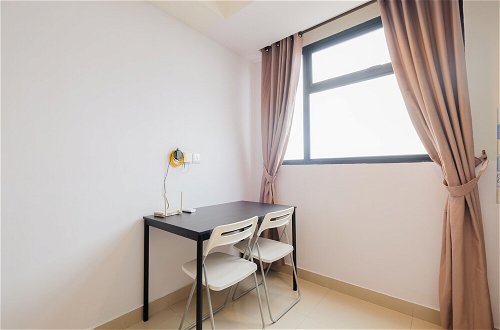 Photo 13 - Minimalist 1Br With Extra Room At Evenciio Margonda Apartment
