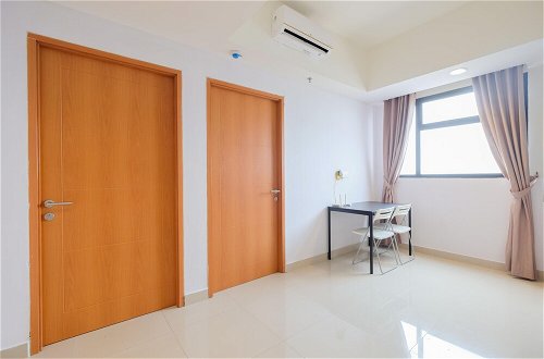 Photo 22 - Minimalist 1Br With Extra Room At Evenciio Margonda Apartment