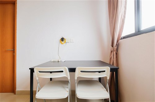 Photo 16 - Minimalist 1Br With Extra Room At Evenciio Margonda Apartment