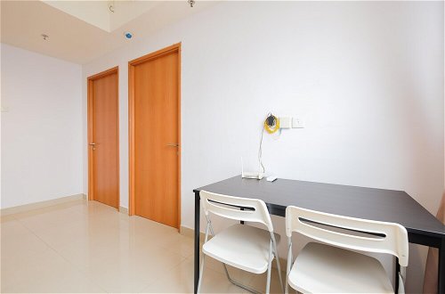 Photo 15 - Minimalist 1Br With Extra Room At Evenciio Margonda Apartment