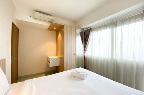 Photo 2 - Cozy And Minimalist 2Br At 8Th Floor The Oasis Cikarang Apartment