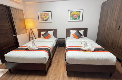 Foto 8 - The Bedrooms Maeklong Service Apartment