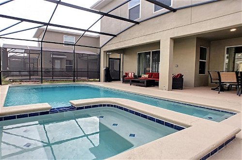 Foto 1 - 6BR Family Villa w Private Pool SPA Near Disney