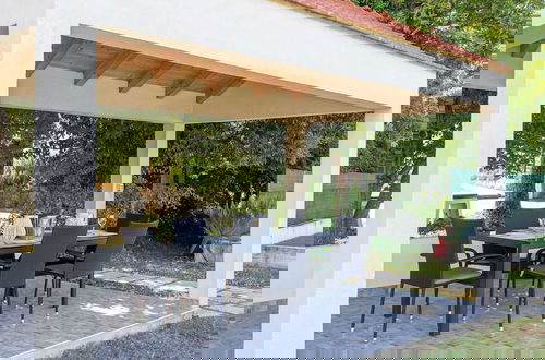 Photo 68 - Spacious Prgomet Retreat With Private Pool, Fitness Centre, and Garden