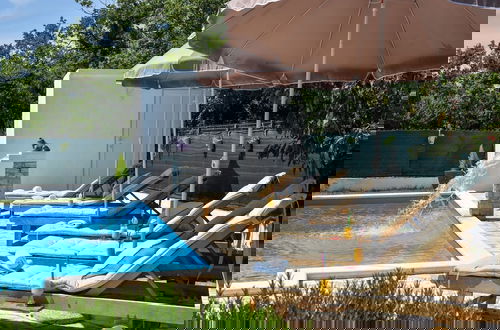 Photo 58 - Spacious Prgomet Retreat With Private Pool, Fitness Centre, and Garden