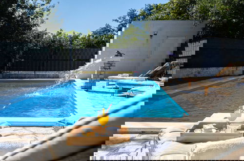 Photo 44 - Spacious Prgomet Retreat With Private Pool, Fitness Centre, and Garden