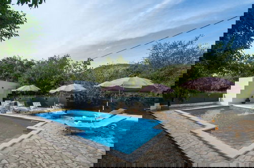 Photo 56 - Spacious Prgomet Retreat With Private Pool, Fitness Centre, and Garden