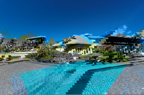 Foto 1 - Island Escape: Secluded Beachfront Cottage With Pool