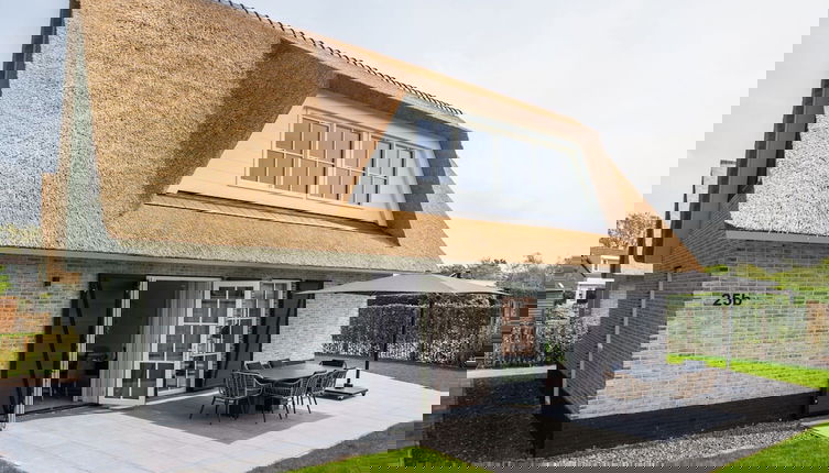 Foto 1 - New Thatched Villa Near the Beach