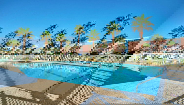 Photo 1 - Steps to Sandfest Beachfront w/ Pool, Balcony Views Beach Happy by Avantstay