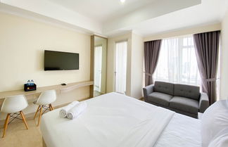 Photo 1 - Well Furnished And Cozy Studio Menteng Park Apartment