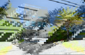 Photo 1 - Sunset Surf 2201 Ave C 6 Bedroom Home by RedAwning