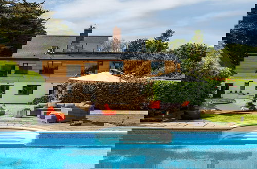 Foto 53 - Stunning 5BR Home With Pool - 5 min to Beach