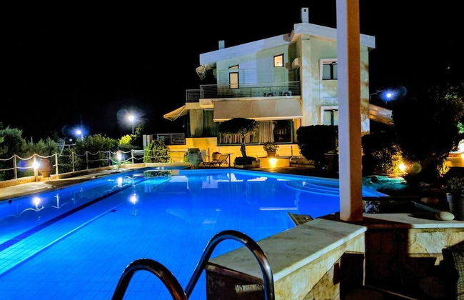 Stunning 4-bed Villa in Lagonisi Kalivia Thorikou - Photo 22
