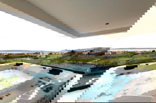 Foto 19 - Moonlit Mirage Villa With Pool, Gym and Sauna