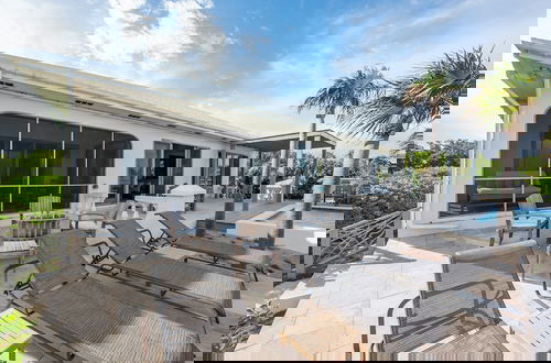 Photo 18 - Seven Palms Serenity: Beachfront Oasis