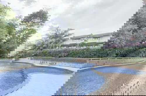 Foto 17 - Serene Abode 1Br At Dago Suites Apartment