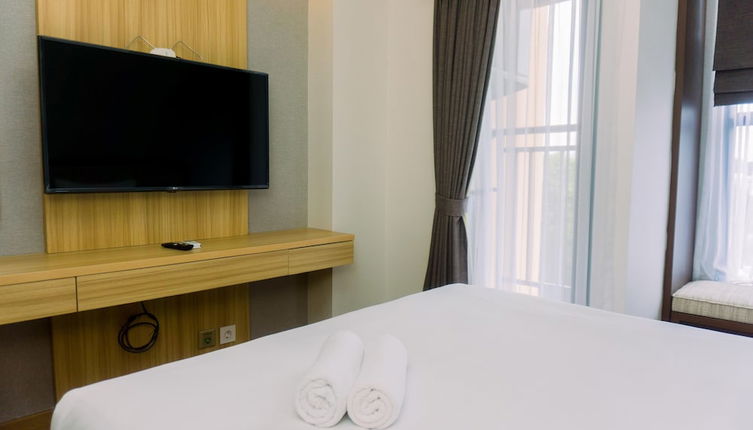 Photo 1 - Minimalist And Warm Studio At Transpark Bintaro Apartment