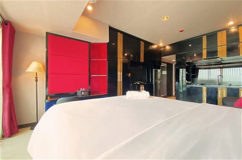 Photo 3 - Clean And Comfy Studio Room At Tamansari La Grande Apartment