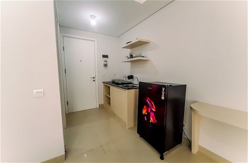 Photo 8 - Cozy Studio Room At Barsa City Apartment
