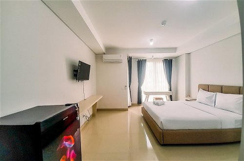 Photo 3 - Cozy Studio Room At Barsa City Apartment