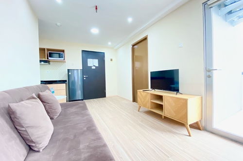 Photo 17 - Spacious 2Br Apartment At Grand Asia Afrika