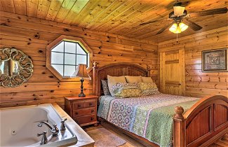 Photo 2 - Sevierville Cabin w/ Games, Hot Tub & 4 King Beds