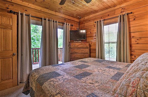 Photo 9 - Sevierville Cabin w/ Games, Hot Tub & 4 King Beds