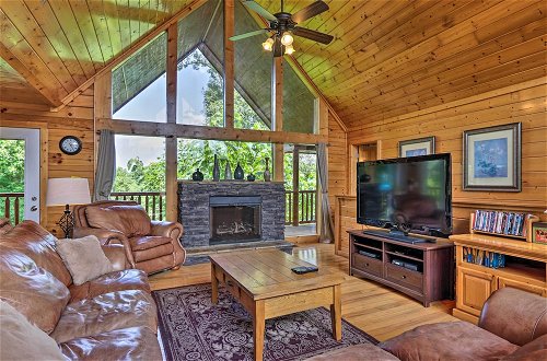 Photo 1 - Sevierville Cabin w/ Games, Hot Tub & 4 King Beds