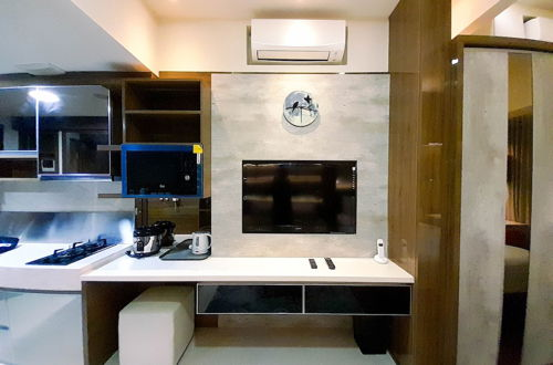 Foto 4 - Cozy Studio Room At Uttara The Icon Apartment