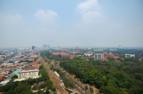 Photo 14 - Homey And Warm Studio Room At Taman Melati Margonda Apartment