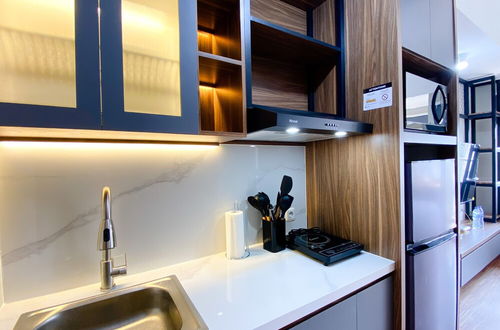 Foto 6 - Homey And Simply Look Studio Gateway Park Lrt City Bekasi Apartment