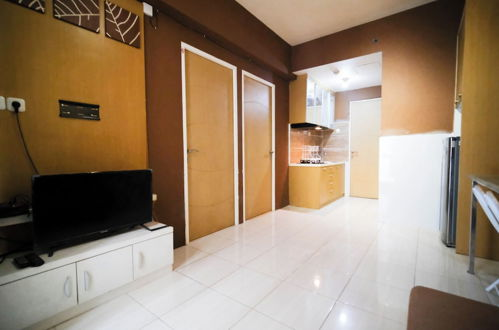 Photo 10 - Comfy And Homey 2Br At Bale Hinggil Apartment