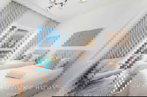 Foto 12 - LUX Luxury Sunrise Beachfront Suite 1